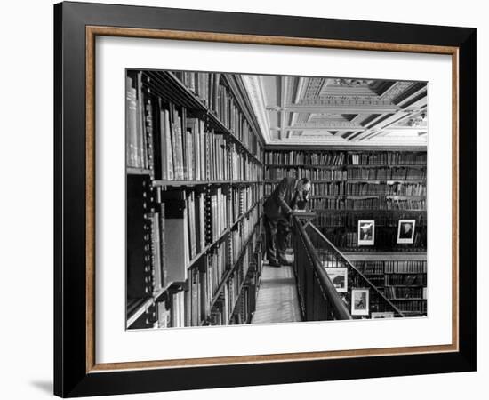 Man Reading Book Among Shelves on Balcony in New York Public Library-Alfred Eisenstaedt-Framed Photographic Print