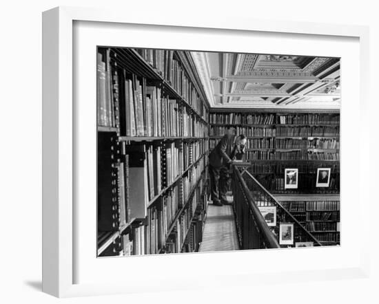 Man Reading Book Among Shelves on Balcony in New York Public Library-Alfred Eisenstaedt-Framed Photographic Print