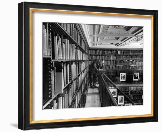 Man Reading Book Among Shelves on Balcony in New York Public Library-Alfred Eisenstaedt-Framed Photographic Print