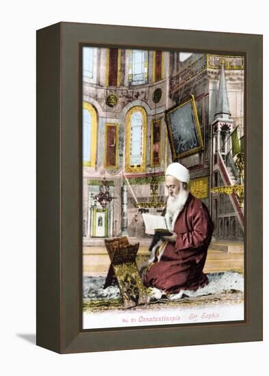 Man Reading Koran in Hagia Sofia-null-Framed Premier Image Canvas