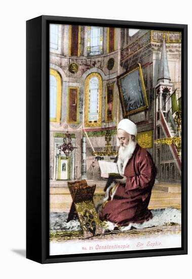 Man Reading Koran in Hagia Sofia-null-Framed Premier Image Canvas