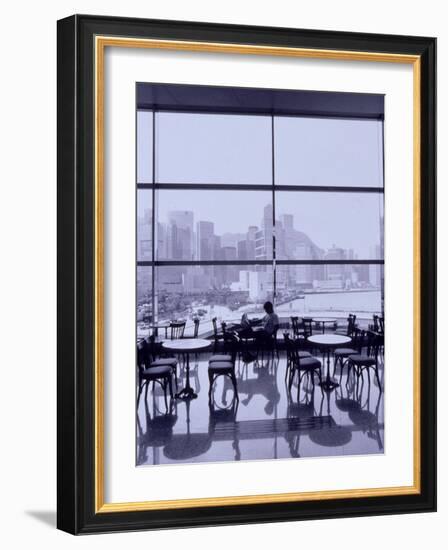 Man Reading Paper, Hong Kong, China-Walter Bibikow-Framed Photographic Print