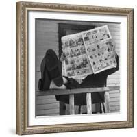Man Reading the Comics Section of the Detroit Times on a Typical Sunday During WWII-Walter Sanders-Framed Photographic Print