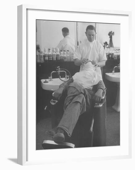 Man Receiving a Shave in a Barber Shop-Cornell Capa-Framed Photographic Print