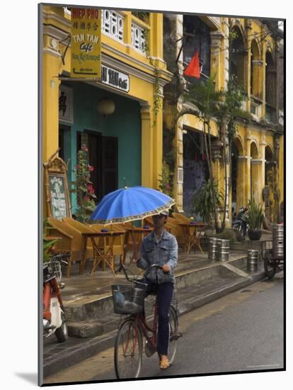 Man Riding a Bike and Holding Umbrella, Hoi An, Indochina-Eitan Simanor-Mounted Photographic Print