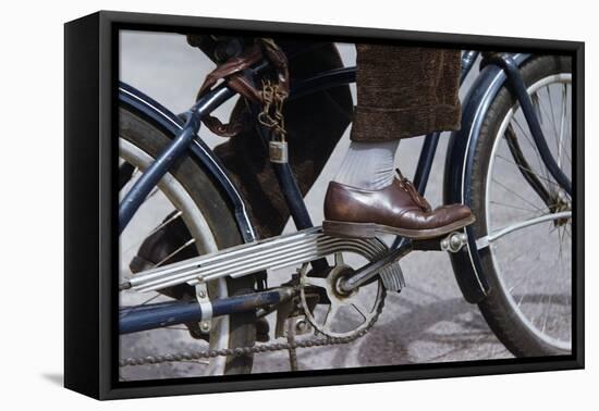 Man Riding Bicycle in Dress Shoes-William P. Gottlieb-Framed Premier Image Canvas