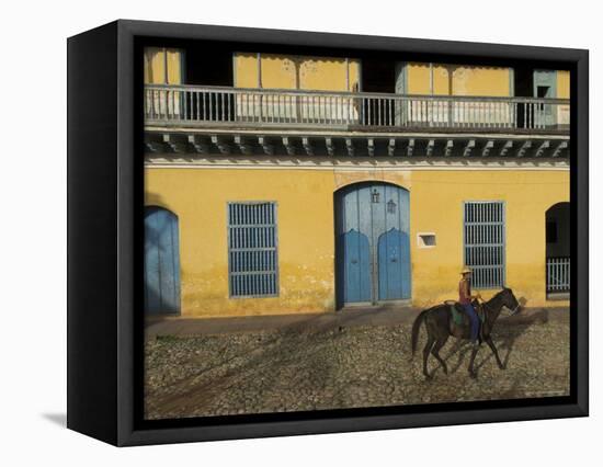 Man Riding Horse Past the Galeria Del Arte (Art Gallery), Plaza Mayor, Trinidad, Cuba-Eitan Simanor-Framed Premier Image Canvas