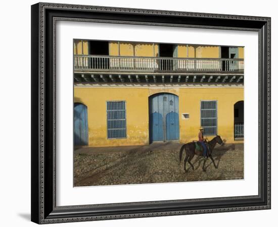 Man Riding Horse Past the Galeria Del Arte (Art Gallery), Plaza Mayor, Trinidad, Cuba-Eitan Simanor-Framed Photographic Print