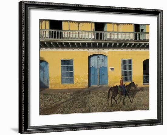 Man Riding Horse Past the Galeria Del Arte (Art Gallery), Plaza Mayor, Trinidad, Cuba-Eitan Simanor-Framed Photographic Print