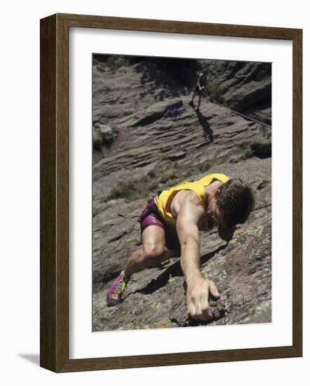 Man Rock Climbing While Tethered to Another Climber Below-null-Framed Photographic Print