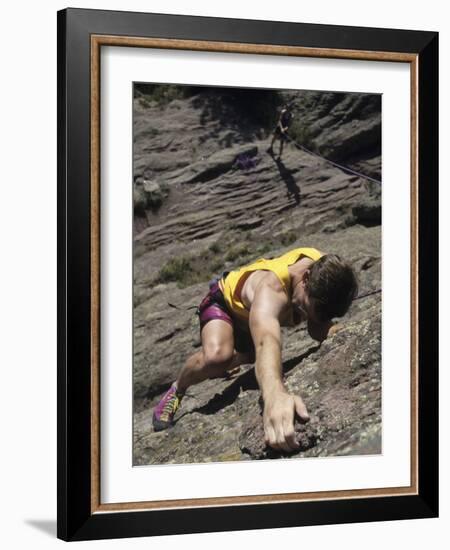 Man Rock Climbing While Tethered to Another Climber Below-null-Framed Photographic Print