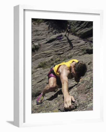 Man Rock Climbing While Tethered to Another Climber Below-null-Framed Photographic Print