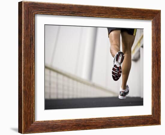 Man Running across a Bridge, United Arab Emirates-Julian Love-Framed Photographic Print