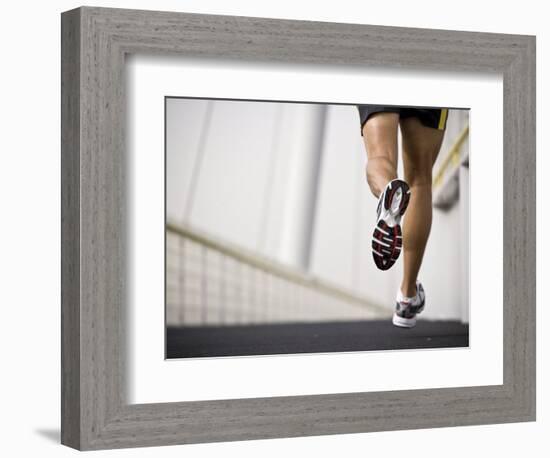 Man Running across a Bridge, United Arab Emirates-Julian Love-Framed Photographic Print