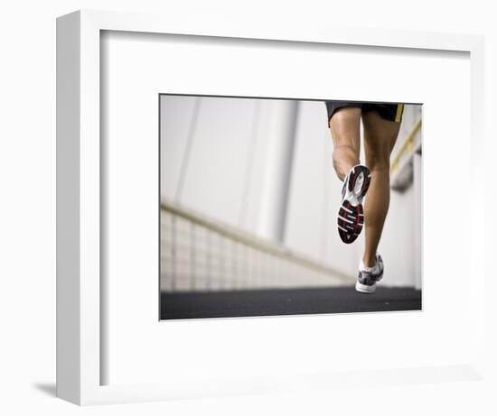 Man Running across a Bridge, United Arab Emirates-Julian Love-Framed Photographic Print