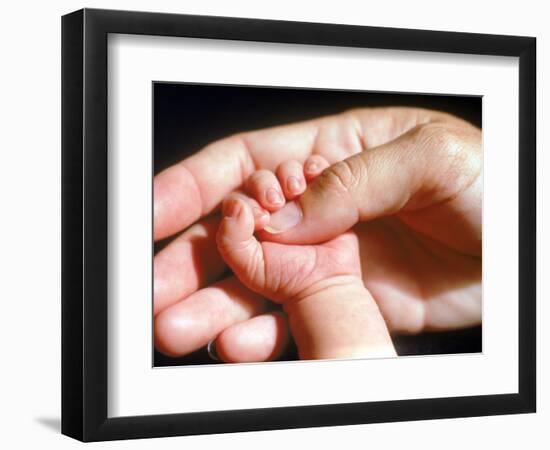 Man's Hand Holding Baby's Hand-Mitch Diamond-Framed Photographic Print