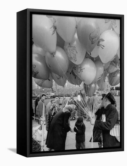 Man Selling Balloons at Dwight D. Eisenhower's Inauguration-Cornell Capa-Framed Premier Image Canvas