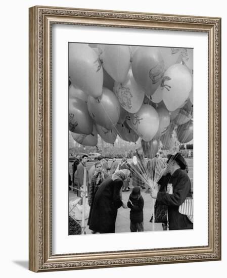 Man Selling Balloons at Dwight D. Eisenhower's Inauguration-Cornell Capa-Framed Photographic Print