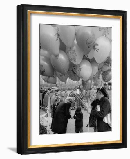 Man Selling Balloons at Dwight D. Eisenhower's Inauguration-Cornell Capa-Framed Photographic Print