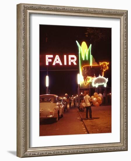 Man Selling Balloons at Entrance of Iowa State Fair-John Dominis-Framed Photographic Print