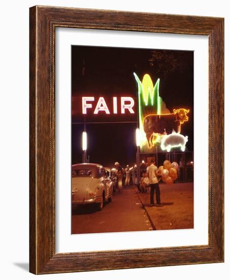 Man Selling Balloons at Entrance of Iowa State Fair-John Dominis-Framed Photographic Print