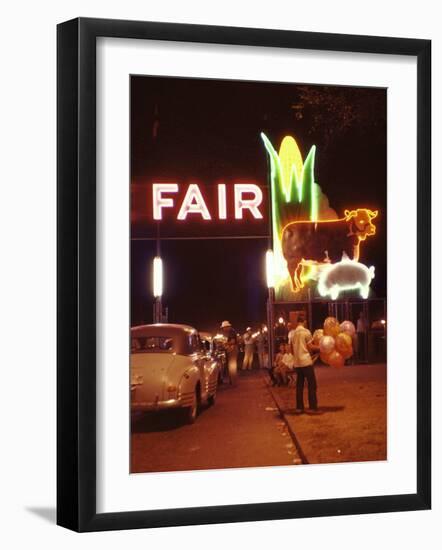 Man Selling Balloons at Entrance of Iowa State Fair-John Dominis-Framed Photographic Print