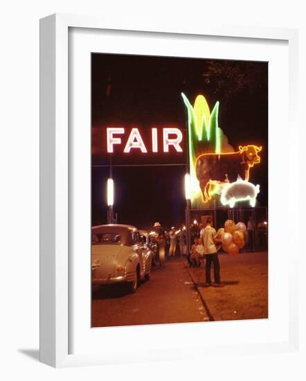 Man Selling Balloons at Entrance of Iowa State Fair-John Dominis-Framed Photographic Print