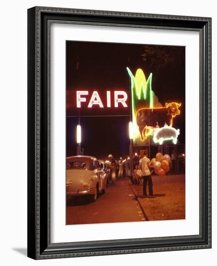 Man Selling Balloons at Entrance of Iowa State Fair-John Dominis-Framed Photographic Print