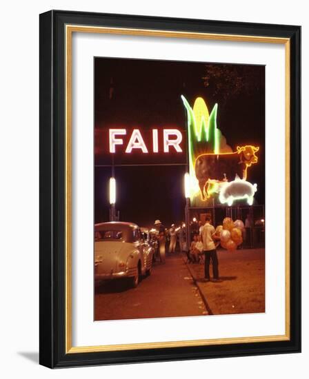 Man Selling Balloons at Entrance of Iowa State Fair-John Dominis-Framed Photographic Print