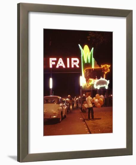 Man Selling Balloons at Entrance of Iowa State Fair-John Dominis-Framed Photographic Print