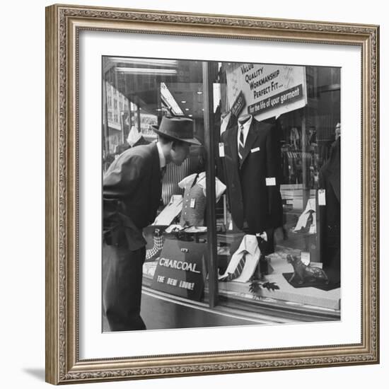 Man Shopping for Clothing-Nina Leen-Framed Photographic Print