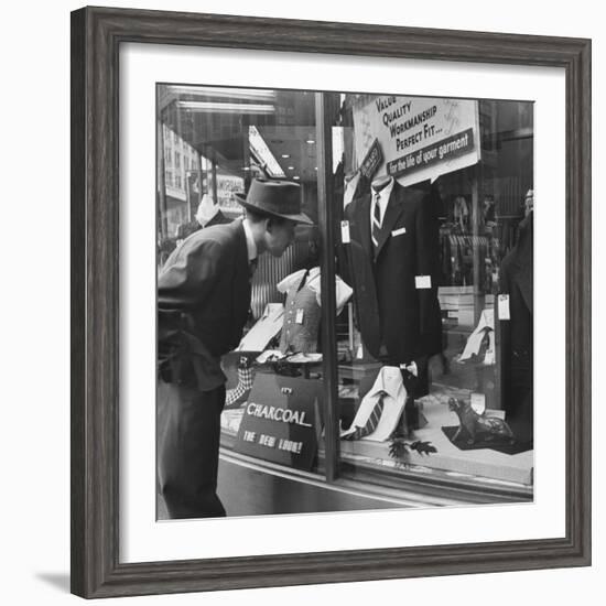 Man Shopping for Clothing-Nina Leen-Framed Photographic Print
