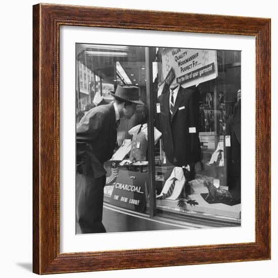 Man Shopping for Clothing-Nina Leen-Framed Photographic Print
