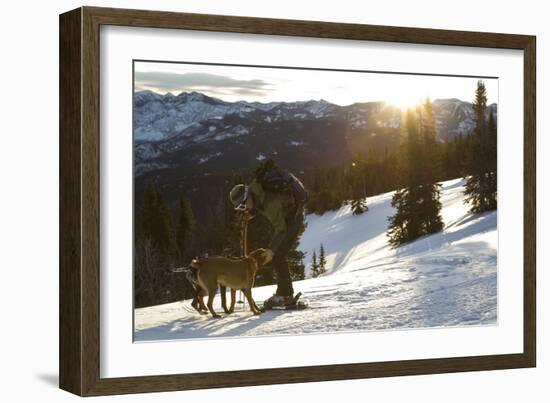 Man Shows His Dogs Affection Before A Morning Backcountry Ski In Montana's Gallatin Range-Hannah Dewey-Framed Photographic Print