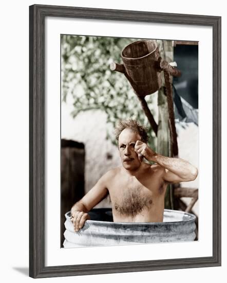 Man Sitting in a Barrel Taking a Bath and Looking Through His Monocle-null-Framed Photo