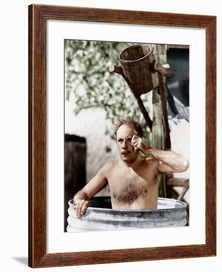 Man Sitting in a Barrel Taking a Bath and Looking Through His Monocle-null-Framed Photo