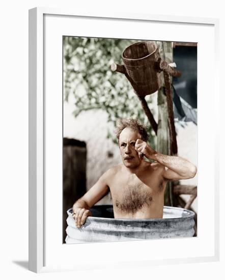 Man Sitting in a Barrel Taking a Bath and Looking Through His Monocle-null-Framed Photo