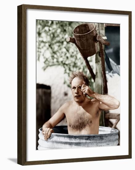 Man Sitting in a Barrel Taking a Bath and Looking Through His Monocle-null-Framed Photo