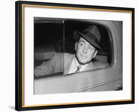 Man Sitting in a Car Looking Out the Window-null-Framed Photo