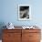 Man Sitting in Chair Outside with Dog-null-Framed Photo displayed on a wall