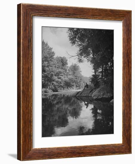 Man Sitting on the Bank of the Upper Opalescent River, a Branch of the Hudson-Margaret Bourke-White-Framed Photographic Print