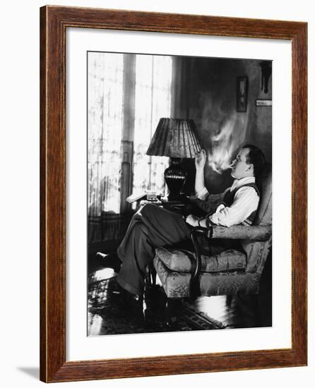 Man Smoking in Living Room-null-Framed Photo