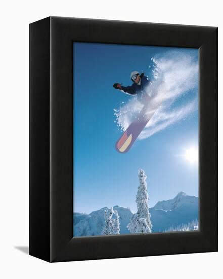 Man snowboarding on sunnny day-Henry Georgi-Framed Premier Image Canvas