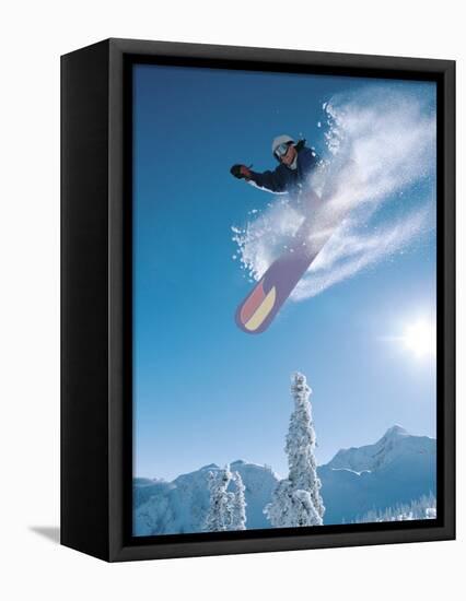 Man snowboarding on sunnny day-Henry Georgi-Framed Premier Image Canvas