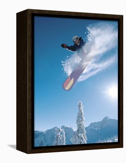 Man snowboarding on sunnny day-Henry Georgi-Framed Premier Image Canvas