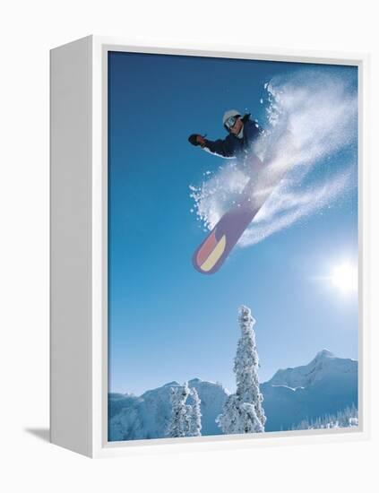 Man snowboarding on sunnny day-Henry Georgi-Framed Premier Image Canvas