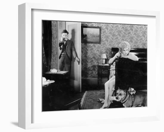 Man Standing in the Doorway Looking at a Woman Angry at Her Dog-null-Framed Photo