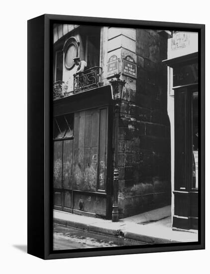 Man Standing on a Balcony over a Lamp Post on the Rue de La Huchette-David Scherman-Framed Premier Image Canvas