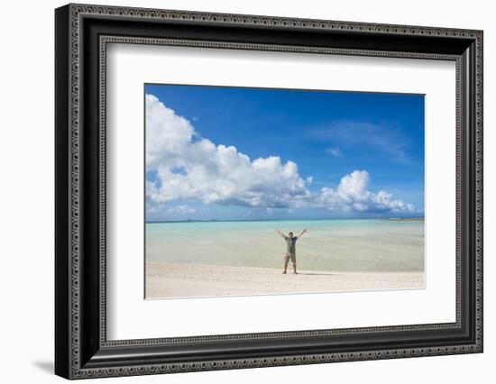 Man standing on a white sand beach in the lagoon of Wallis, Wallis and Futuna, Pacific-Michael Runkel-Framed Photographic Print