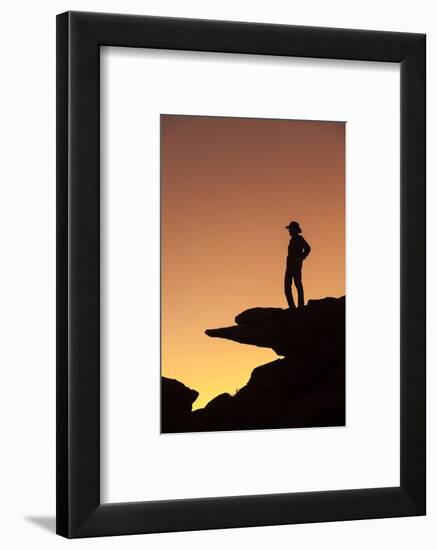 Man standing on rock surveying the view.-Brenda Tharp-Framed Photographic Print